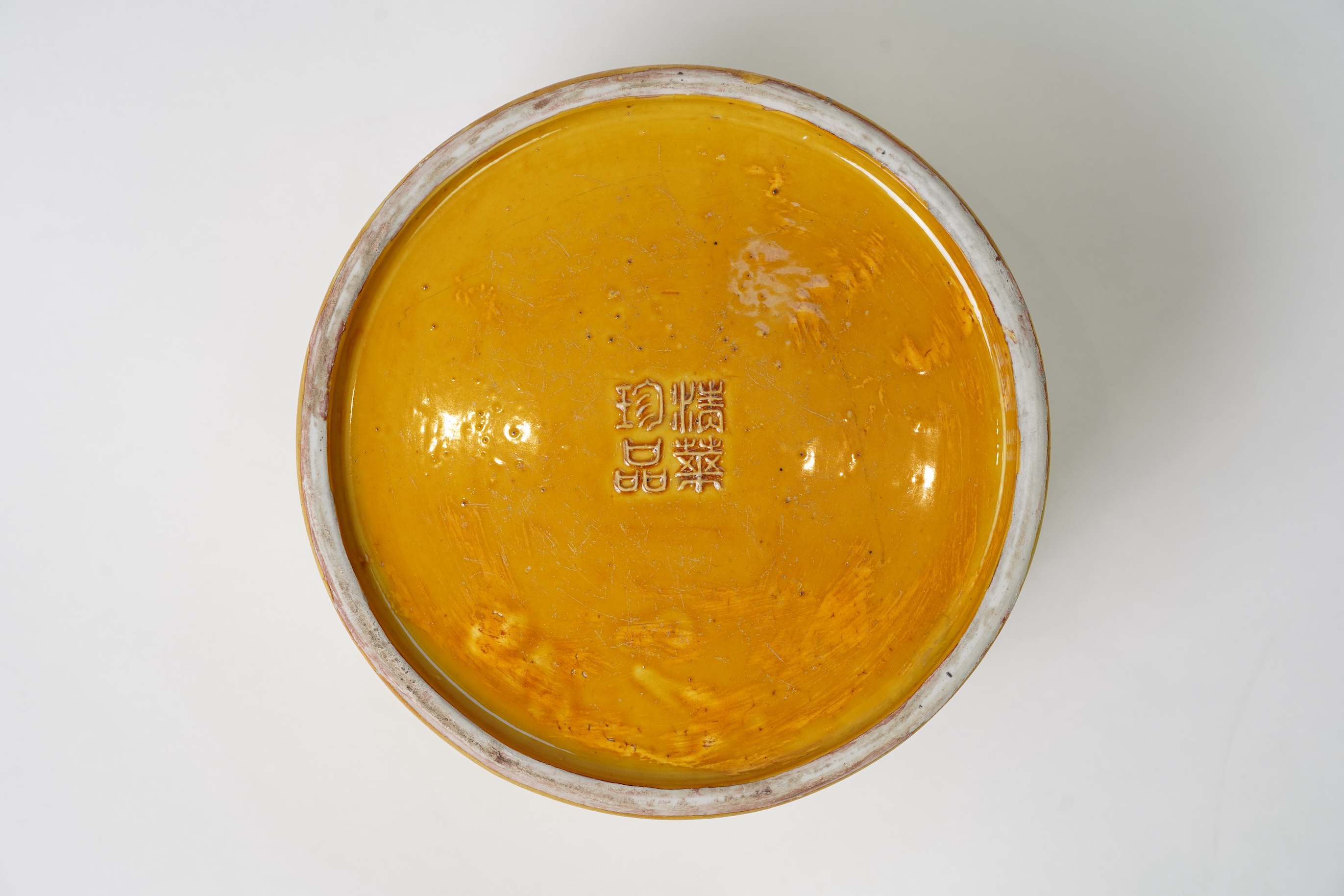 A Chinese yellow glazed 'dragon' brush pot, possibly Republic period